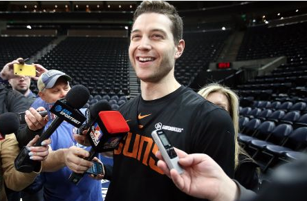 Jimmer Fredette being interviewed while in a Suns jersey